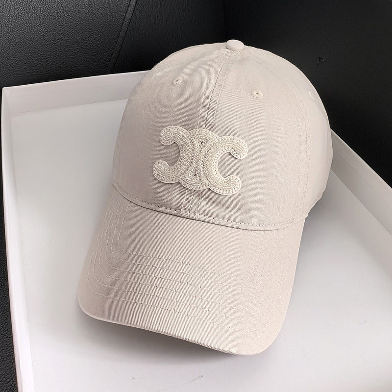 Fashionable embroidered canvas cap